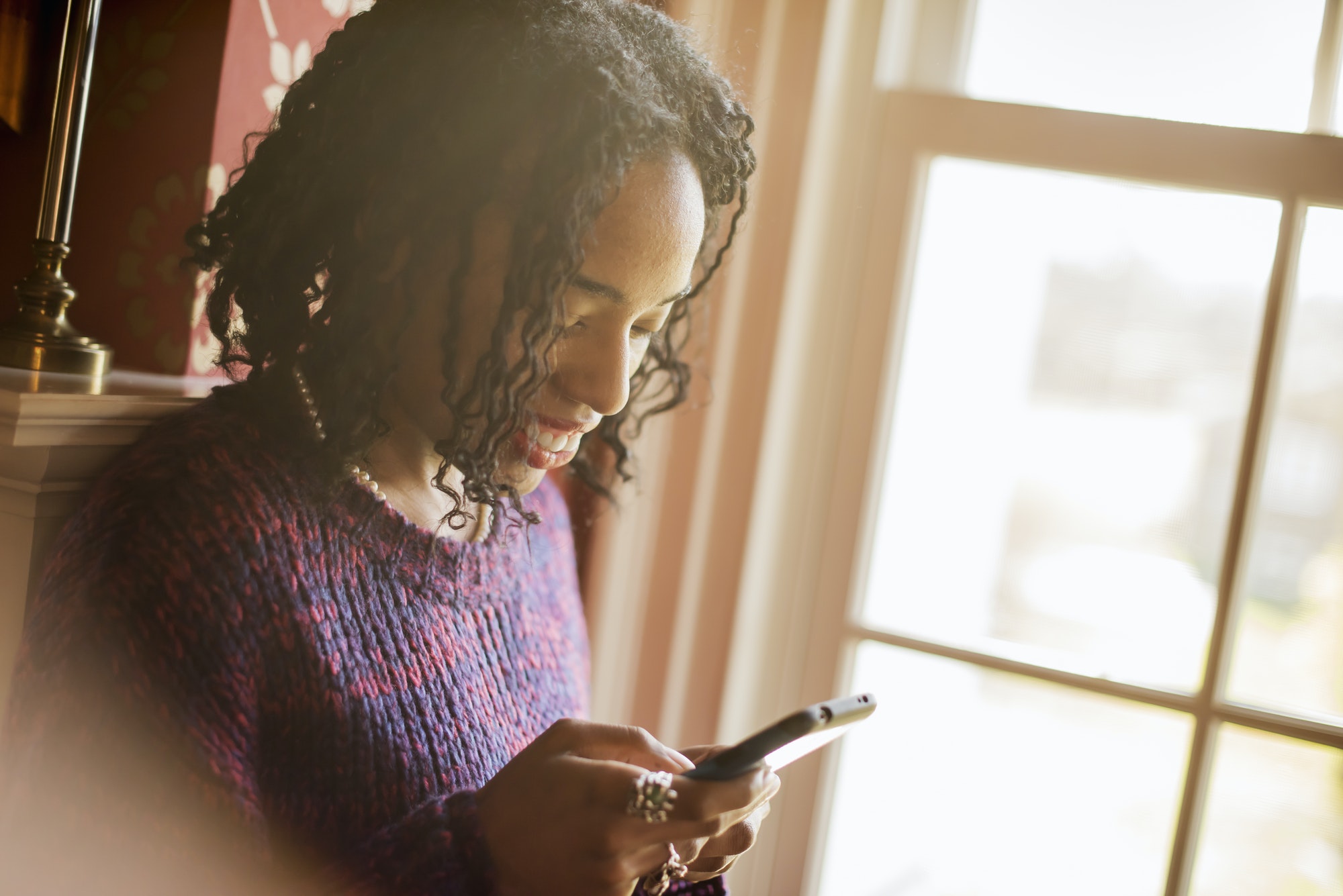 A woman checking her cell phone.