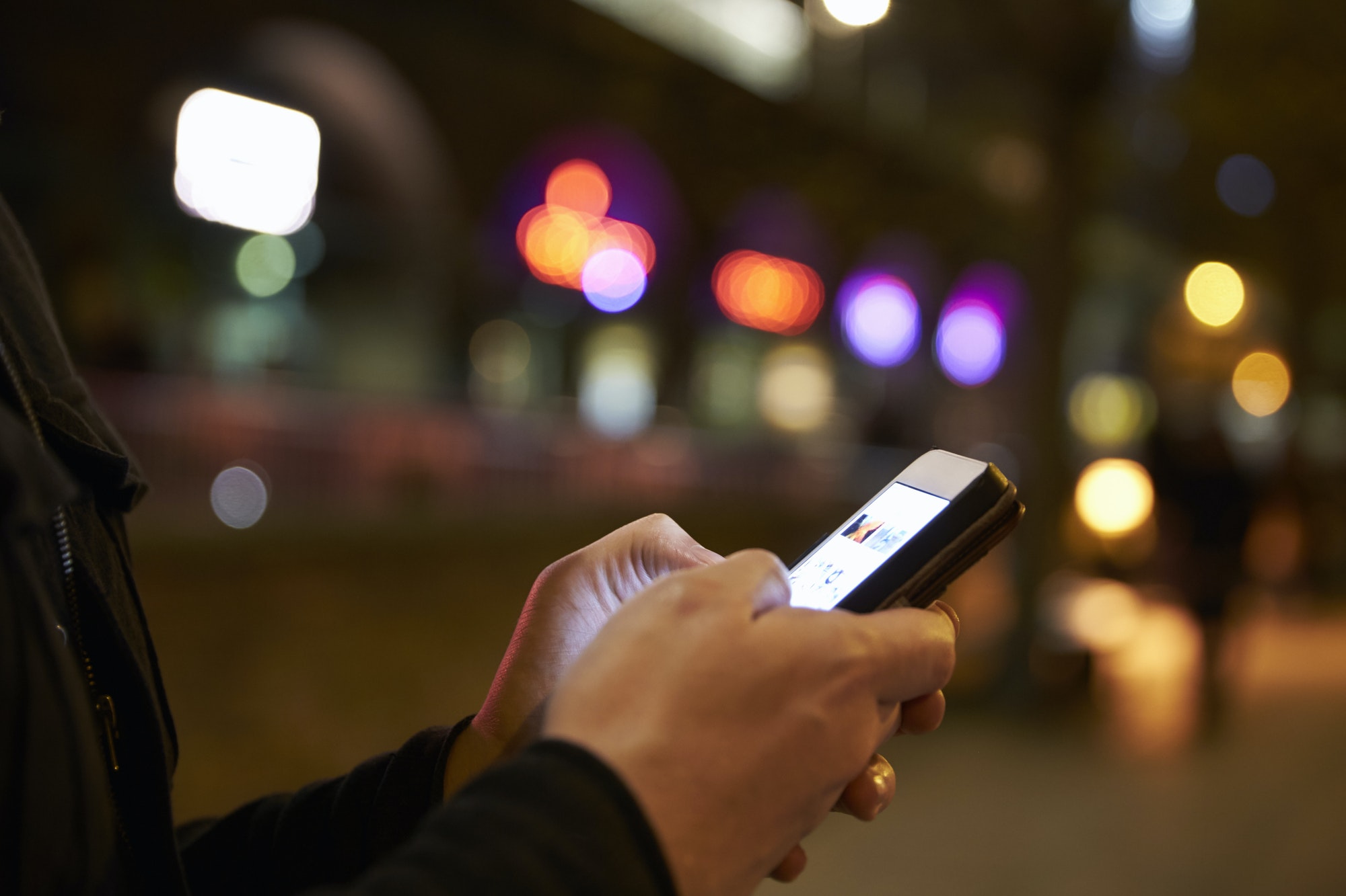 Person Using Mobile Phone
